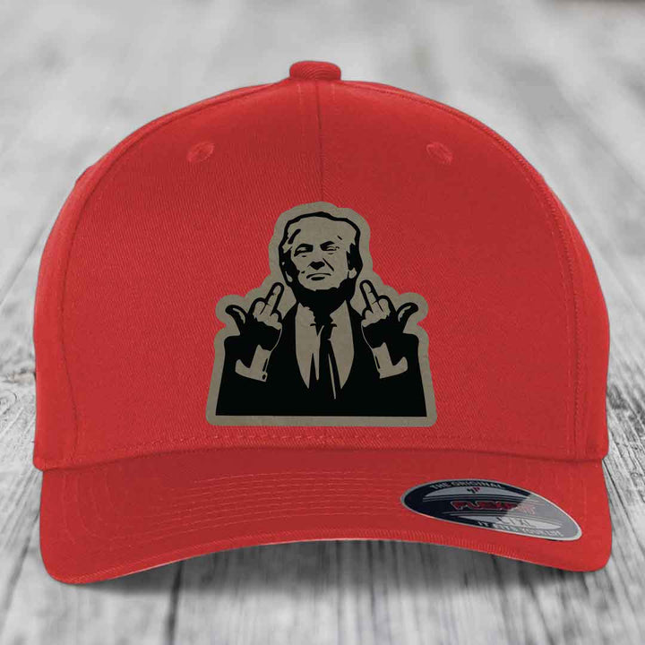 Red baseball cap with black and grey graphic of a man making hand gestures.