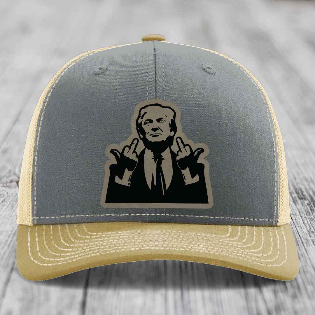 Grey and beige trucker hat with black silhouette patch of man making rude hand gestures.