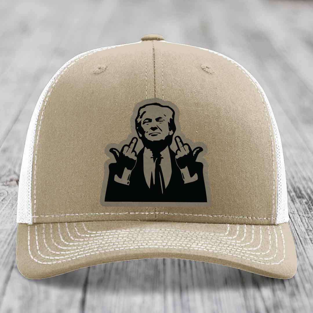 Tan trucker hat with black silhouette patch of a man making rude hand gestures.