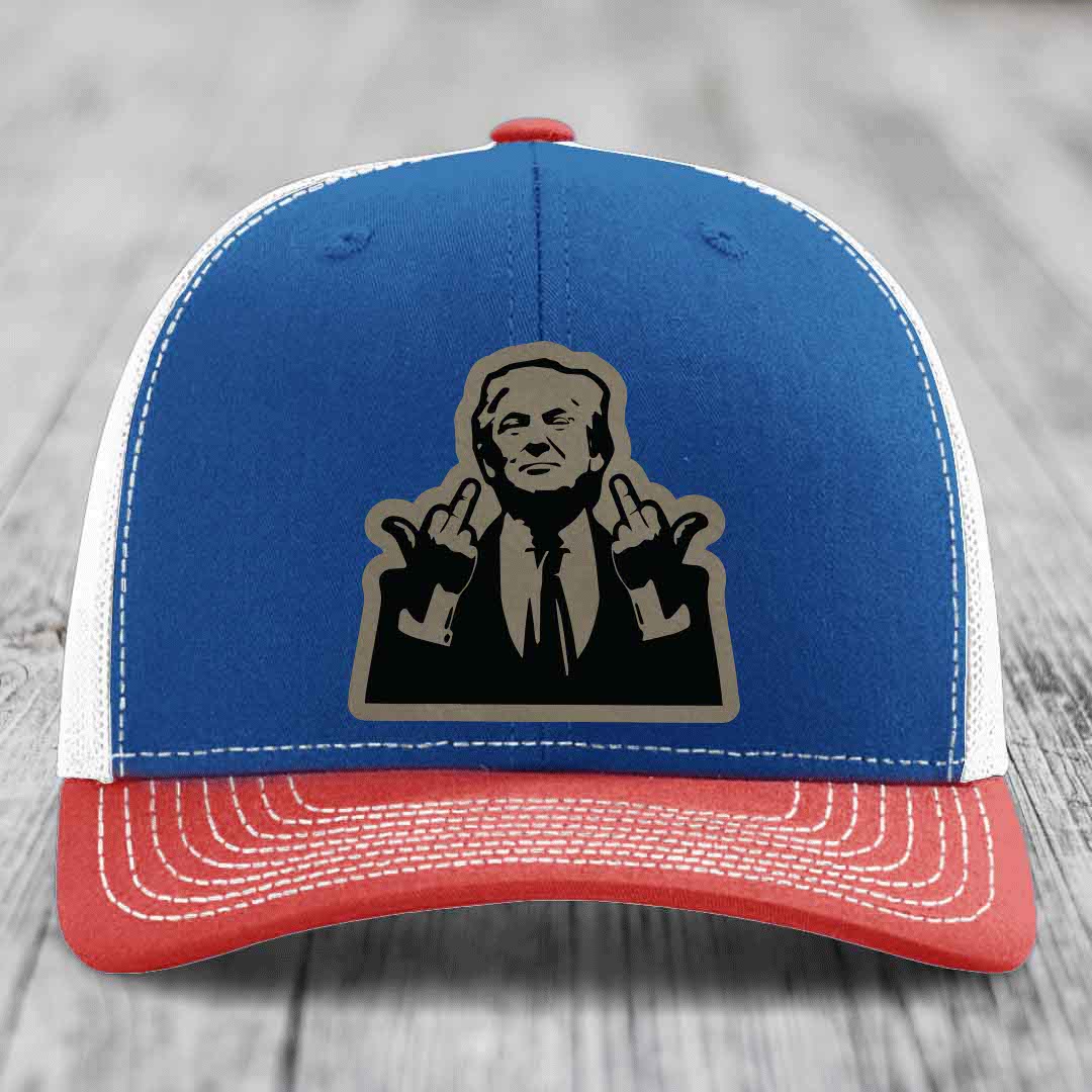 Blue and red trucker hat with white stitching and a black-and-grey graphic patch of a man making hand gestures.