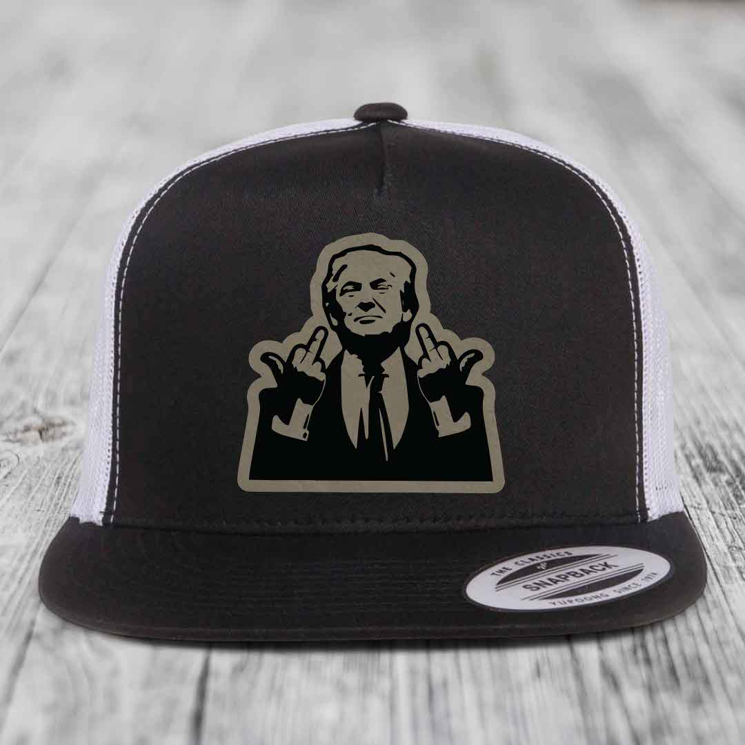 Black and white trucker hat with a graphic patch of a man making hand gestures.