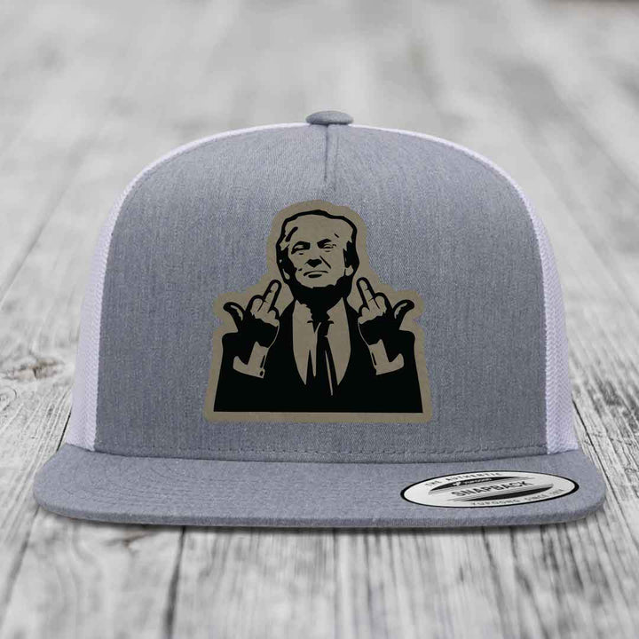 Grey and white trucker hat with a black and tan patch of a man making hand gestures.