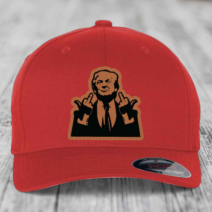 Red baseball cap with black and tan patch of a man making hand gestures.