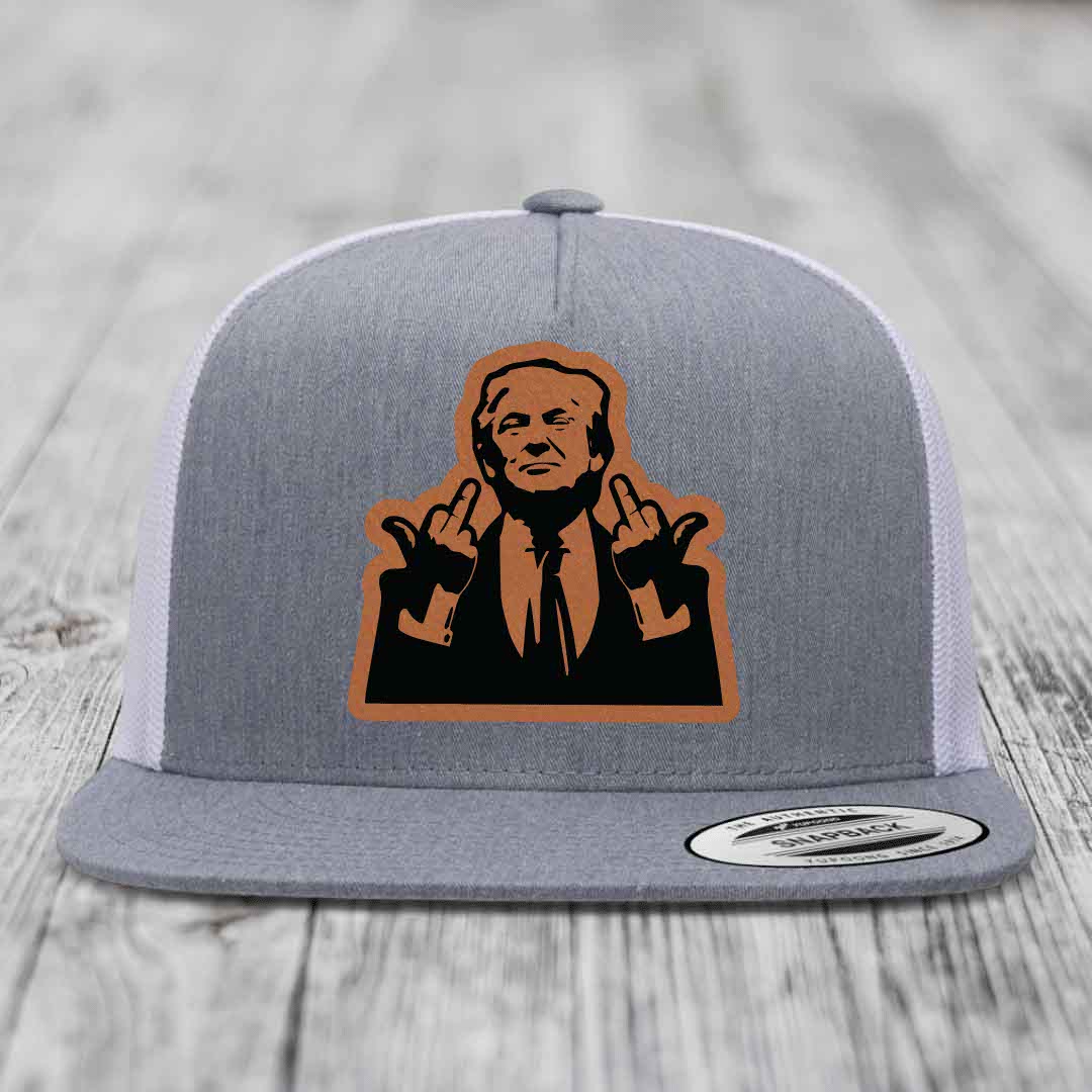 Grey trucker hat with orange and black leather patch of man making rude hand gestures.