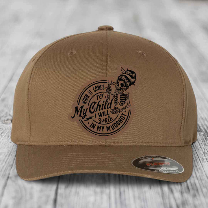 When It Comes To My Child, I Will Smile In My Mugshot (Mama) - Leather Patch Hat - Dark Brown to Black Patch - Flexfit 6277 Fitted Hat