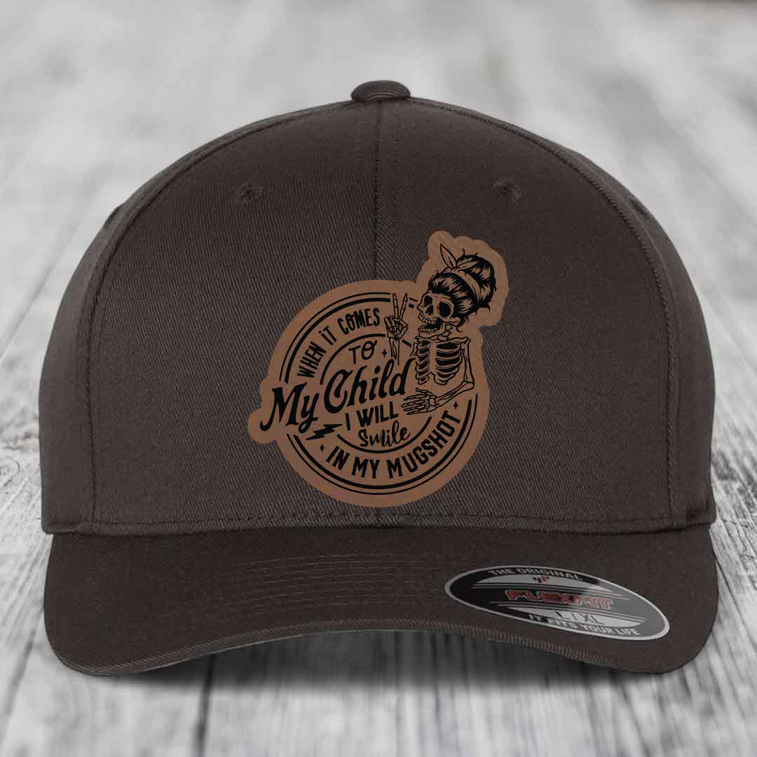 When It Comes To My Child, I Will Smile In My Mugshot (Mama) - Leather Patch Hat - Dark Brown to Black Patch - Flexfit 6277 Fitted Hat