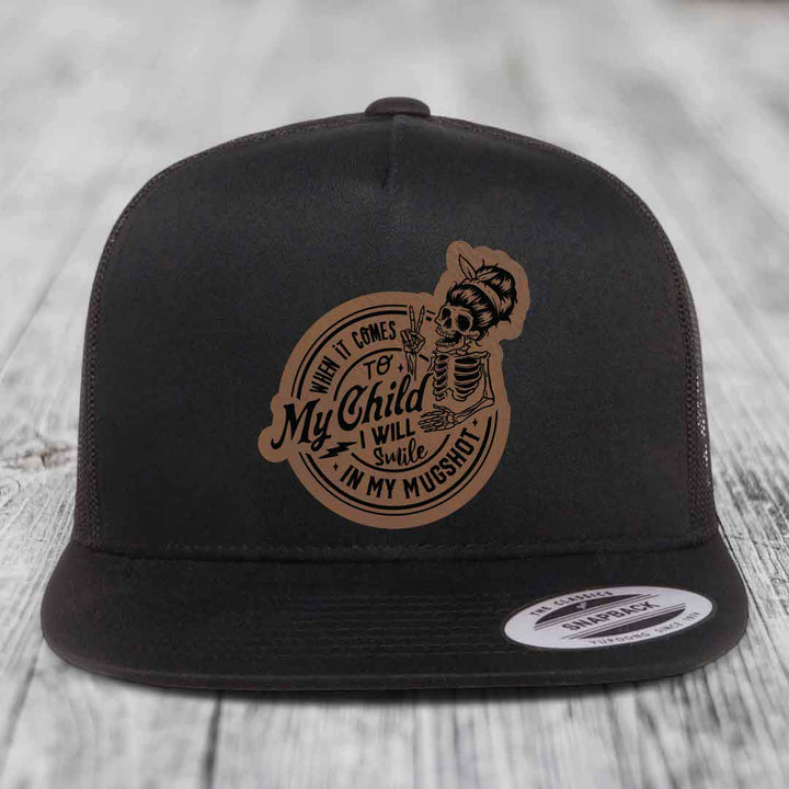 When It Comes To My Child, I Will Smile In My Mugshot (Mama) - Leather Patch Hat - Dark Brown to Black Patch - Yupoong 6006 Snapback Flatbill Hat