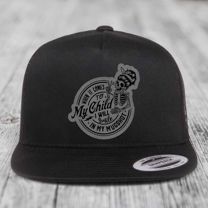 When It Comes To My Child, I Will Smile In My Mugshot (Mama) - Leather Patch Hat - Grey to Black Patch - Yupoong 6006 Snapback Flatbill Hat