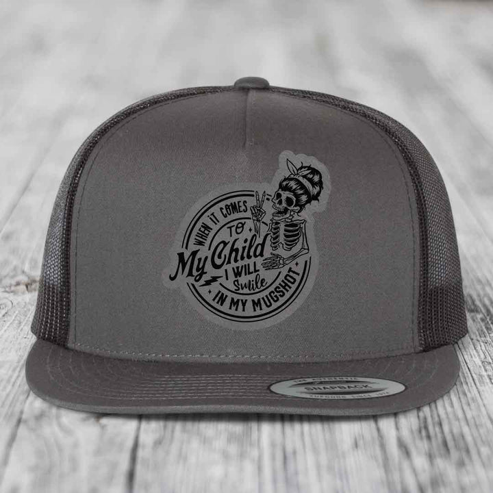 When It Comes To My Child, I Will Smile In My Mugshot (Mama) - Leather Patch Hat - Grey to Black Patch - Yupoong 6006 Snapback Flatbill Hat