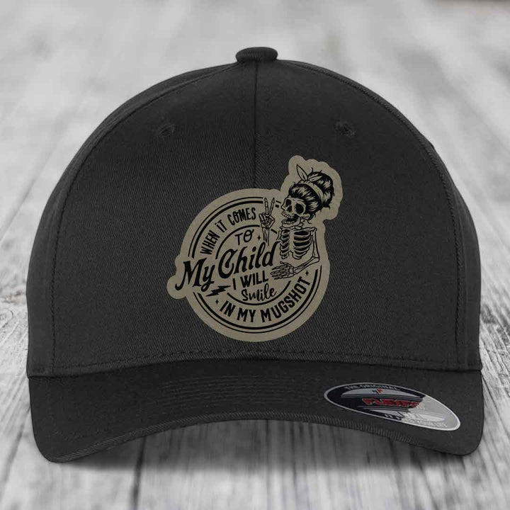 When It Comes To My Child, I Will Smile In My Mugshot (Mama) - Leather Patch Hat - Light Brown to Black Patch - Flexfit 6277 Fitted Hat