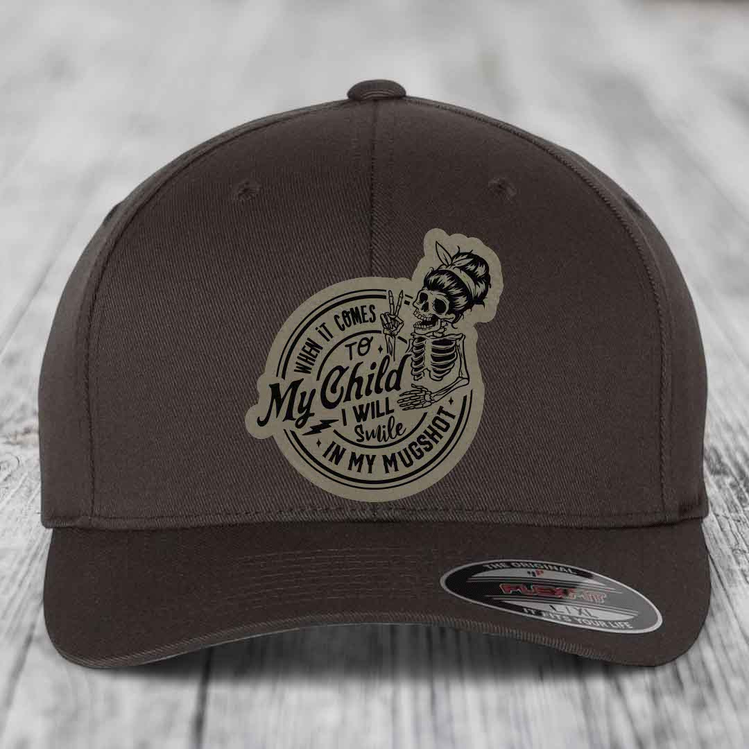 When It Comes To My Child, I Will Smile In My Mugshot (Mama) - Leather Patch Hat - Light Brown to Black Patch - Flexfit 6277 Fitted Hat