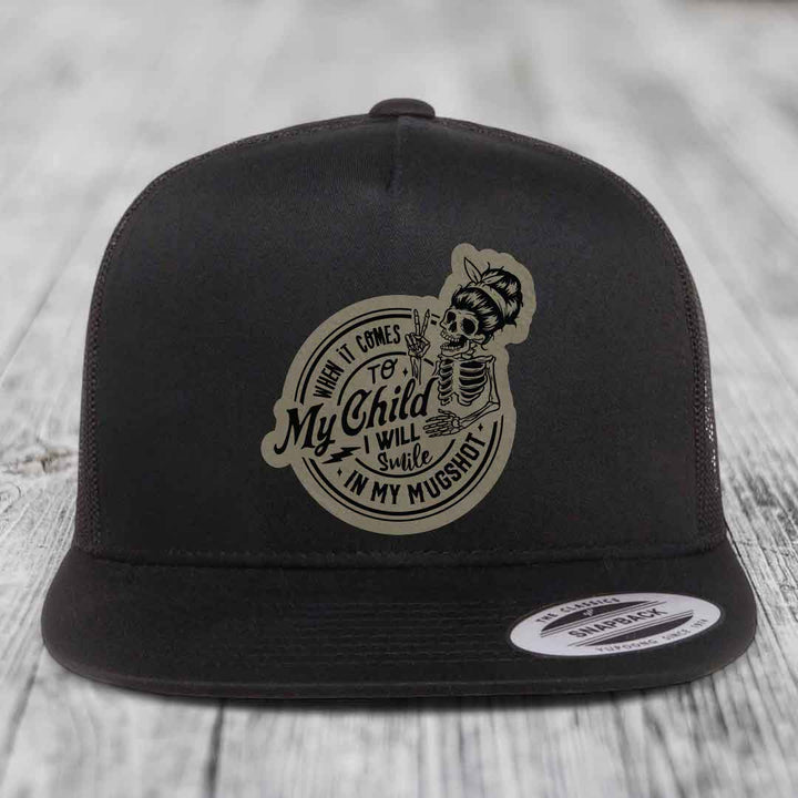 When It Comes To My Child, I Will Smile In My Mugshot (Mama) - Leather Patch Hat - Light Brown to Black Patch - Yupoong 6006 Snapback Flatbill Hat