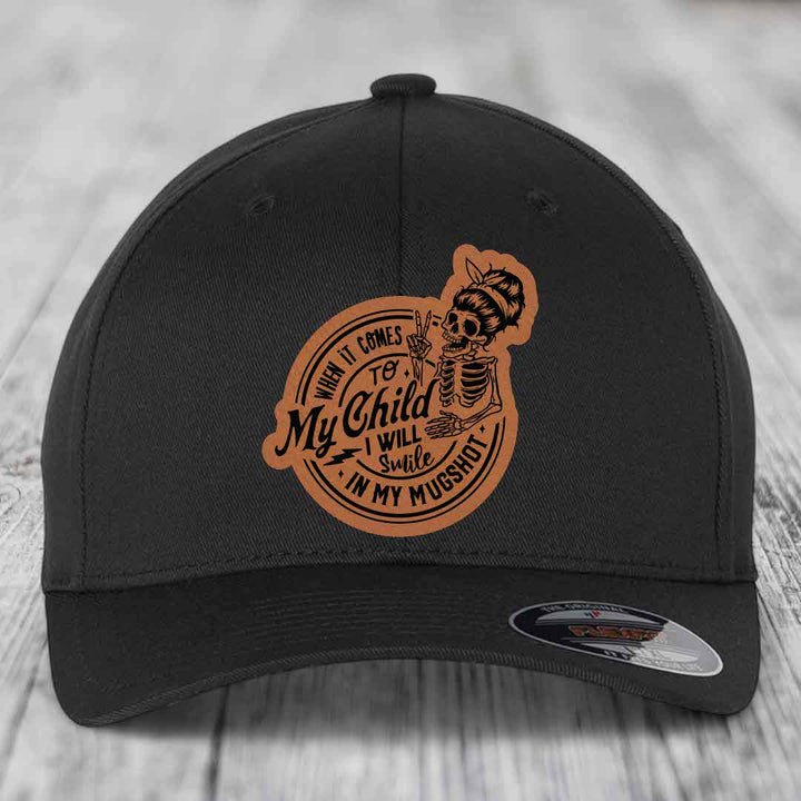 When It Comes To My Child, I Will Smile In My Mugshot (Mama) - Leather Patch Hat - Rawhide to Black Patch - Flexfit 6277 Fitted Hat