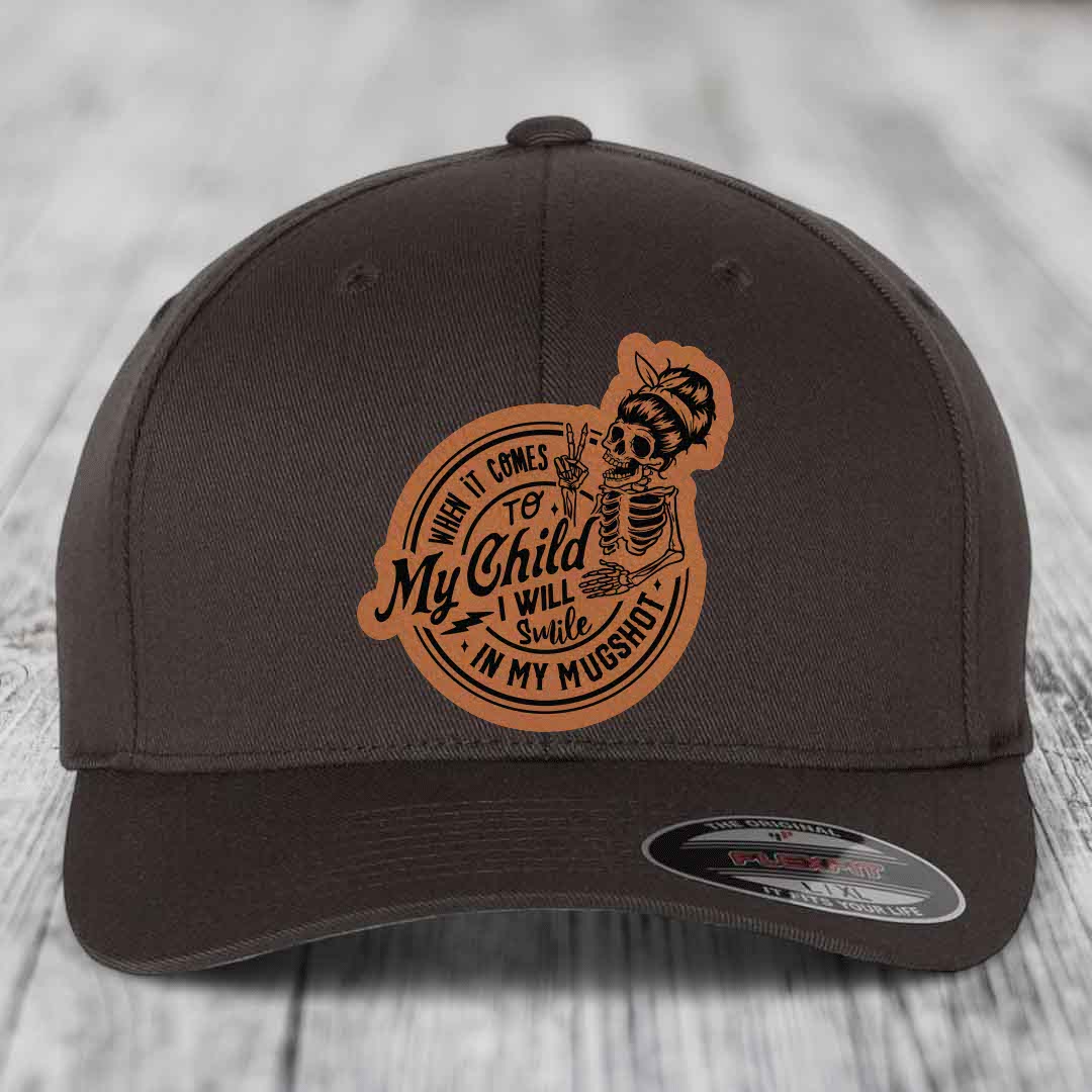 When It Comes To My Child, I Will Smile In My Mugshot (Mama) - Leather Patch Hat - Rawhide to Black Patch - Flexfit 6277 Fitted Hat