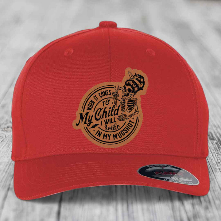 When It Comes To My Child, I Will Smile In My Mugshot (Mama) - Leather Patch Hat - Rawhide to Black Patch - Flexfit 6277 Fitted Hat