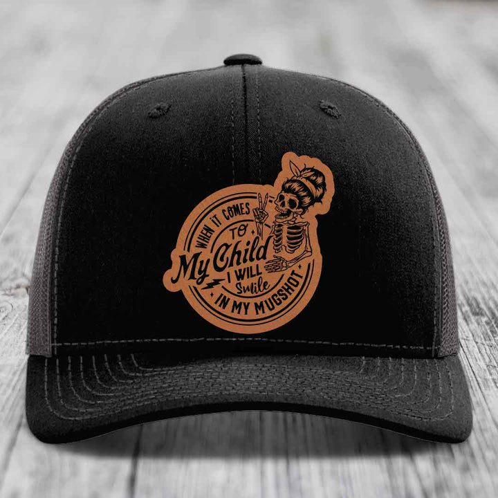 When It Comes To My Child, I Will Smile In My Mugshot (Mama) - Leather Patch Hat - Rawhide to Black Patch - Richardson 112 Snapback Trucker Hat