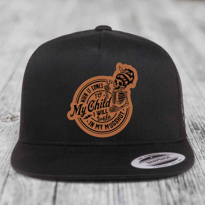 When It Comes To My Child, I Will Smile In My Mugshot (Mama) - Leather Patch Hat - Rawhide to Black Patch - Yupoong 6006 Snapback Flatbill Hat
