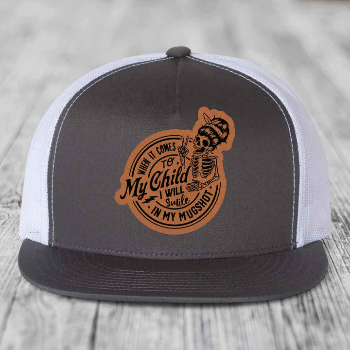 When It Comes To My Child, I Will Smile In My Mugshot (Mama) - Leather Patch Hat - Rawhide to Black Patch - Yupoong 6006 Snapback Flatbill Hat