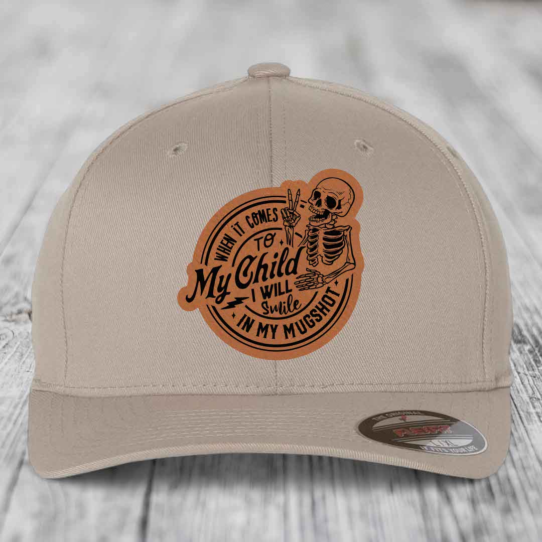 When It Comes To My Child, I Will Smile In My Mugshot (Papa) - Leather Patch Hat - Rawhide to Black Patch - Flexfit 6277 Fitted Hat