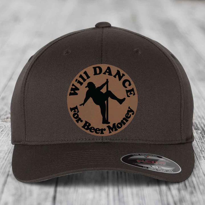 Dark brown baseball cap with circular leather patch showing silhouette dancing for beer money.