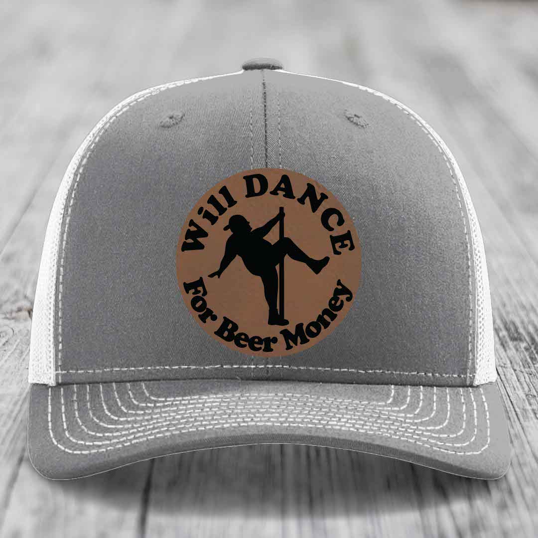 Grey trucker hat with brown circular patch showing pole dancer silhouette and text &