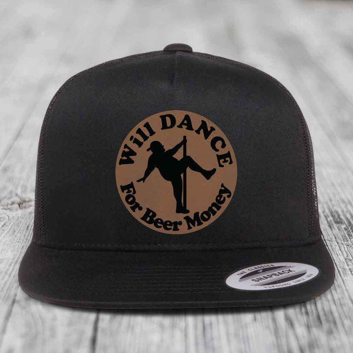Black snapback hat with circular brown patch showing silhouette of person pole dancing and text &