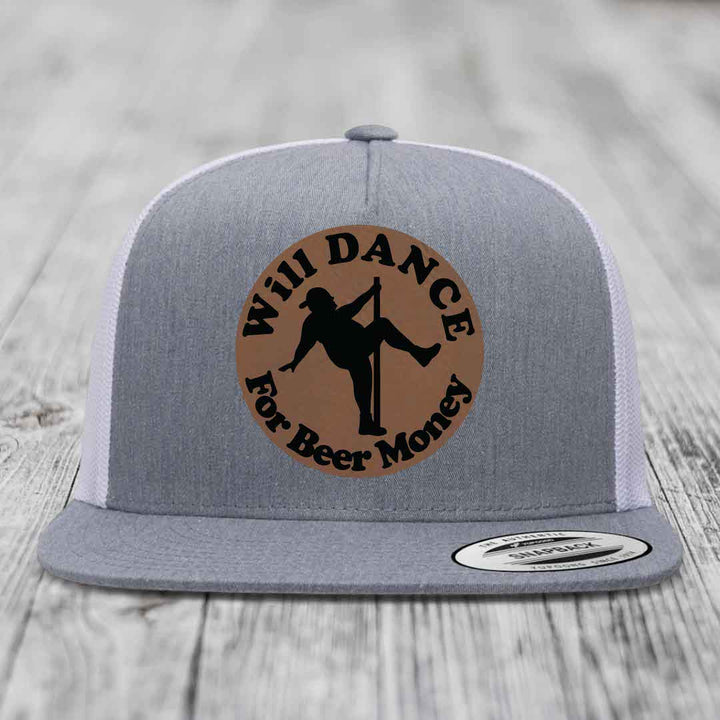 Grey trucker hat with brown circular patch showing silhouette of person pole dancing and text &