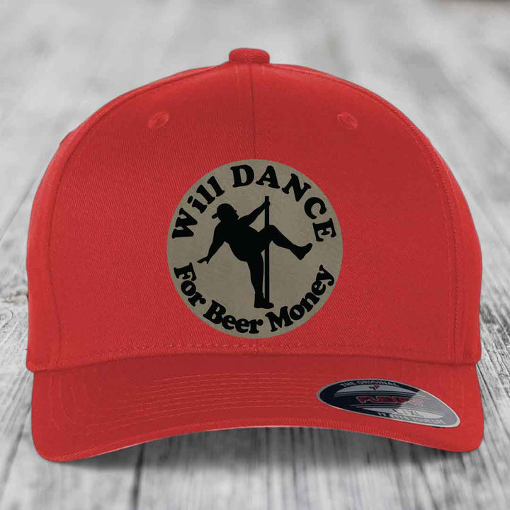 Red baseball cap with circular patch showing silhouette of person dancing on pole and text &