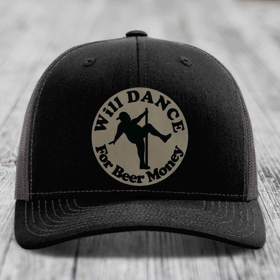 Black trucker hat with circular patch showing silhouette of person dancing on pole and text &