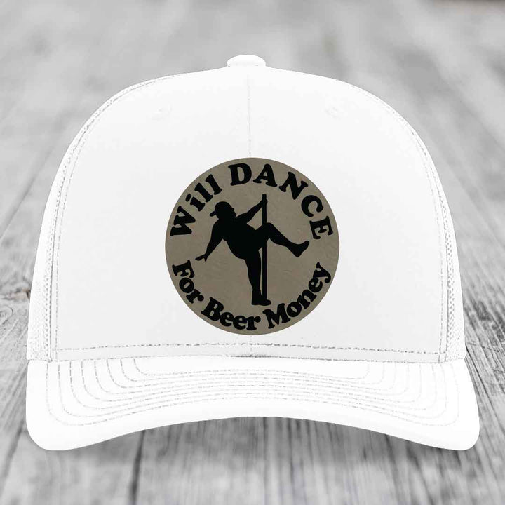 White trucker hat with circular patch showing silhouette of person pole dancing and text &