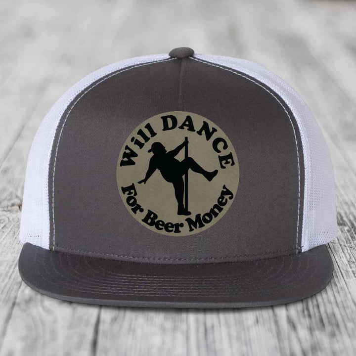 Grey and white trucker hat with circular patch showing silhouette dancing on pole and text &