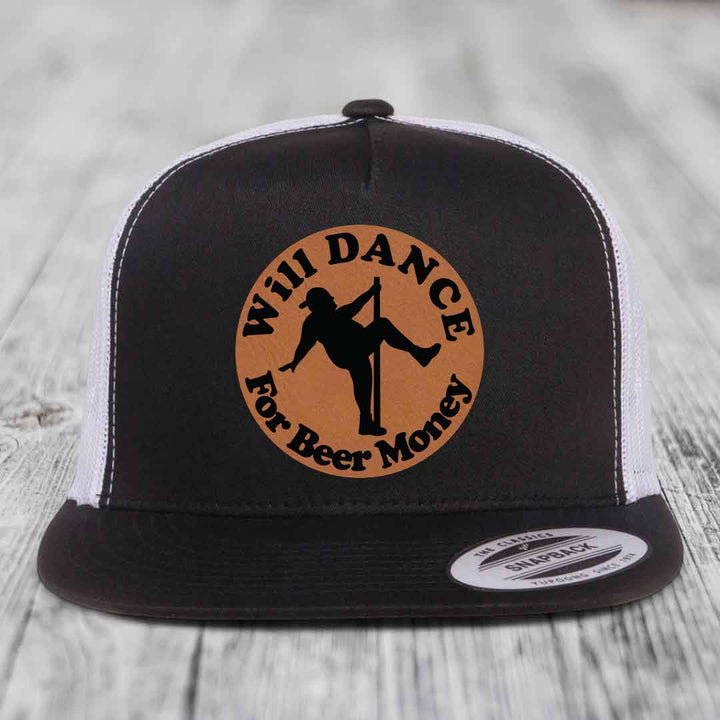 Black and white trucker hat with brown circular patch showing silhouette of person pole dancing with text &