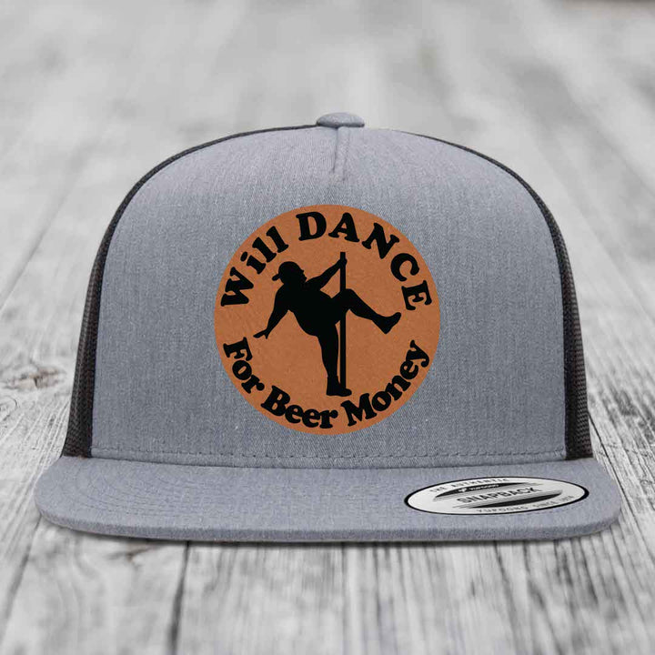 Grey trucker hat with brown circular patch showing pole dancer silhouette and text &