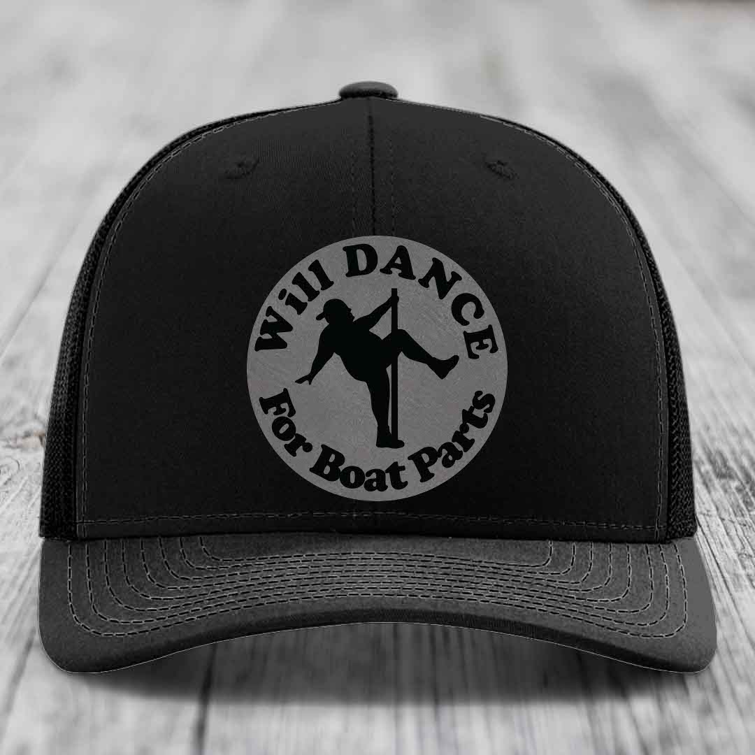 Black trucker hat with circular patch reading &