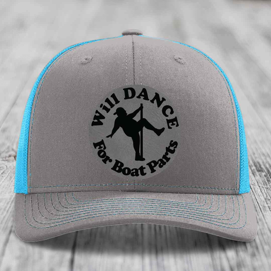 Grey trucker hat with blue mesh sides and black embroidered patch reading &
