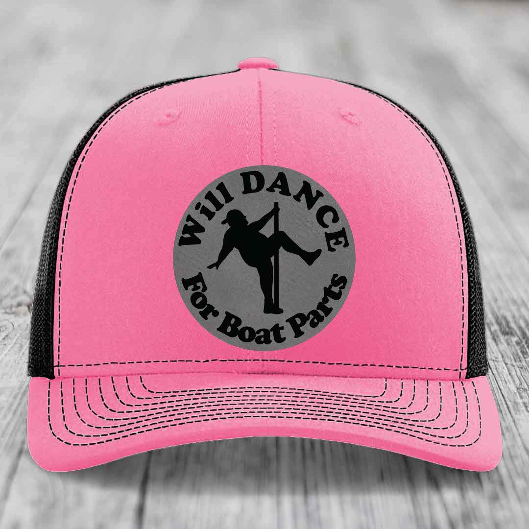 Pink trucker hat with black mesh back and gray circular patch featuring a pole dancer silhouette and text &