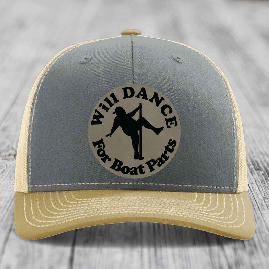 Grey and beige trucker hat with circular leather patch reading &
