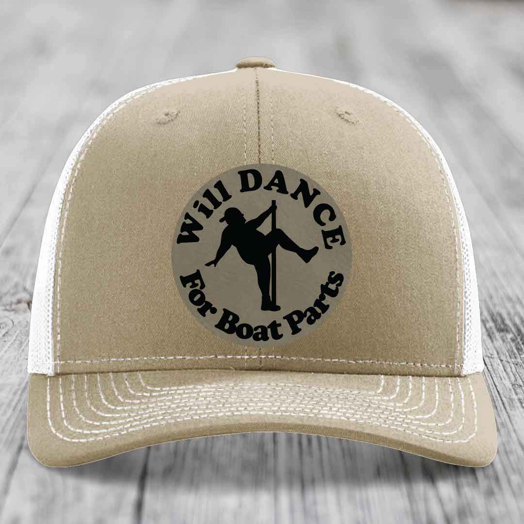 Tan trucker hat with black embroidered patch reading &