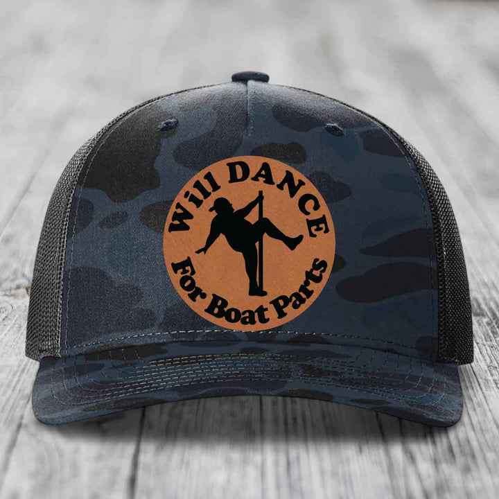 Camouflage trucker hat with brown circular patch reading &