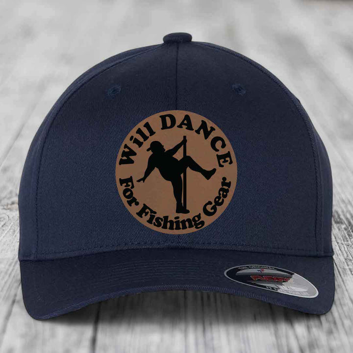 Dark blue baseball cap with circular brown patch showing silhouette of person pole dancing with text &