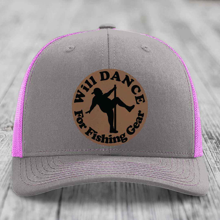 Grey trucker hat with pink mesh sides and a brown circular patch that says &