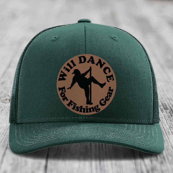 Green trucker hat with brown circular patch showing silhouette dancing and text &