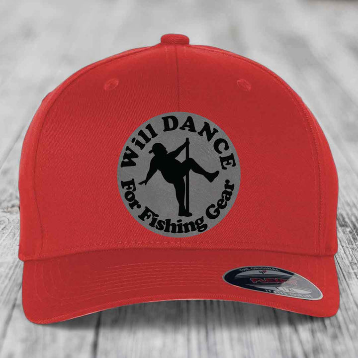 Red baseball cap with circular grey patch featuring black silhouette of dancer and text &