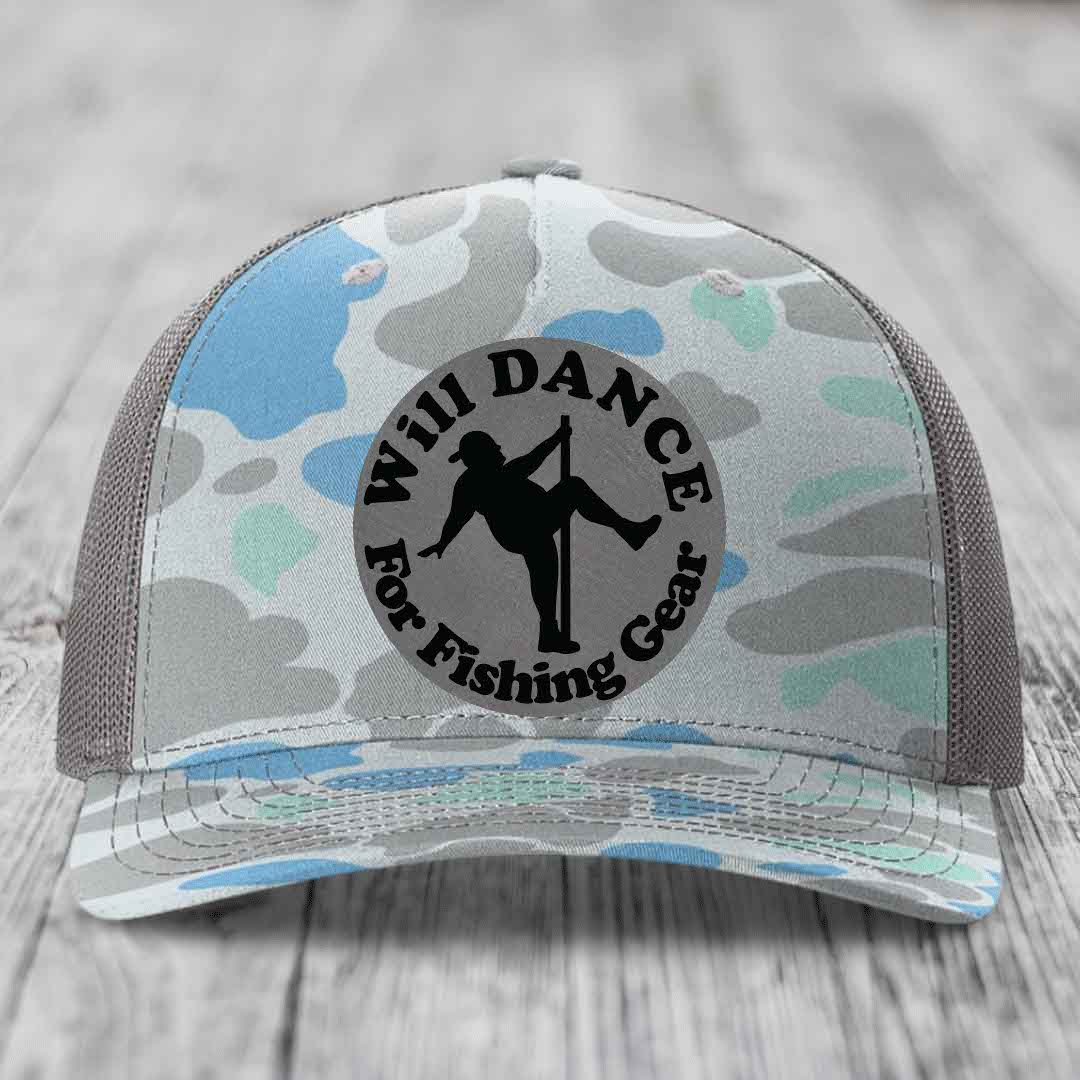 Camouflage trucker hat with black circular patch reading &