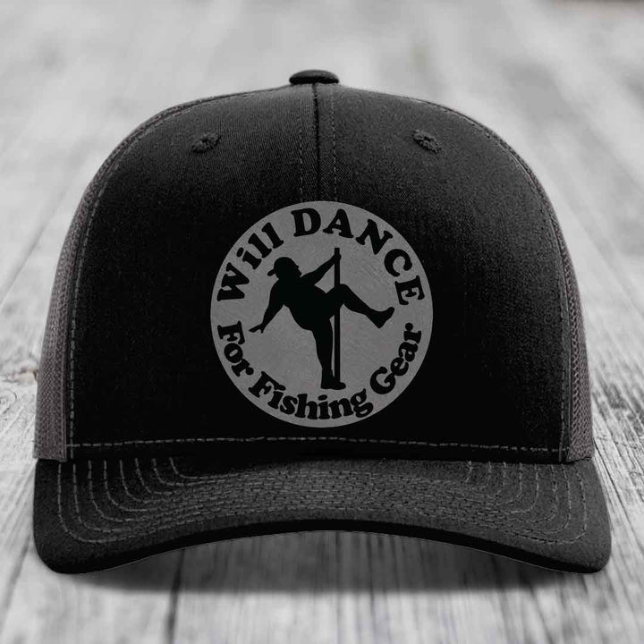 Black trucker hat with circular patch reading &