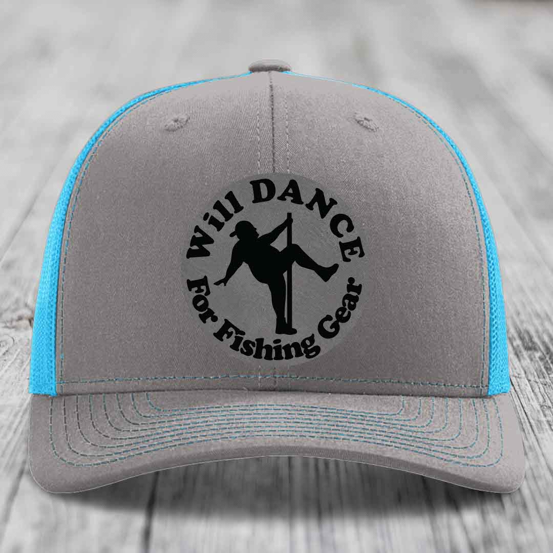 Grey trucker hat with blue mesh back and black embroidered patch reading &