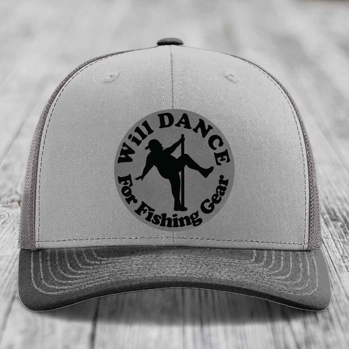 Grey trucker hat with black circular patch reading &