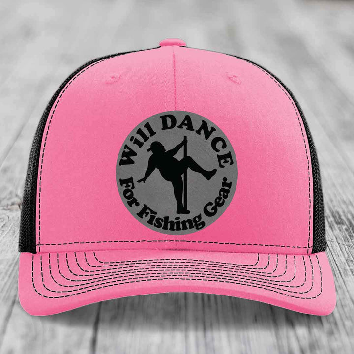 Pink trucker hat with black mesh back and gray circular patch reading &