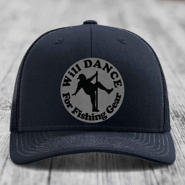 Dark blue trucker hat with circular patch showing silhouette dancing and text &