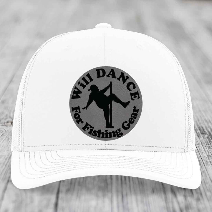 White trucker hat with circular black patch reading &